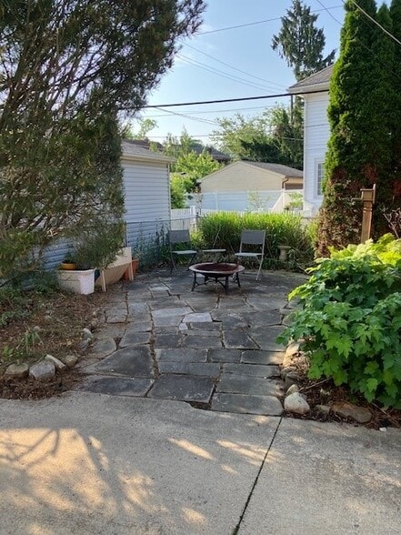 rear sandstone patio - 17003 Hilliard Rd