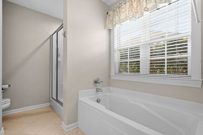 Building Photo - Live the Coastal Lifestyle in This Cypress Keys Beauty!