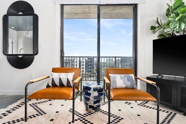 Building Photo - Midtown Magic: Big Savings + Big Perks!