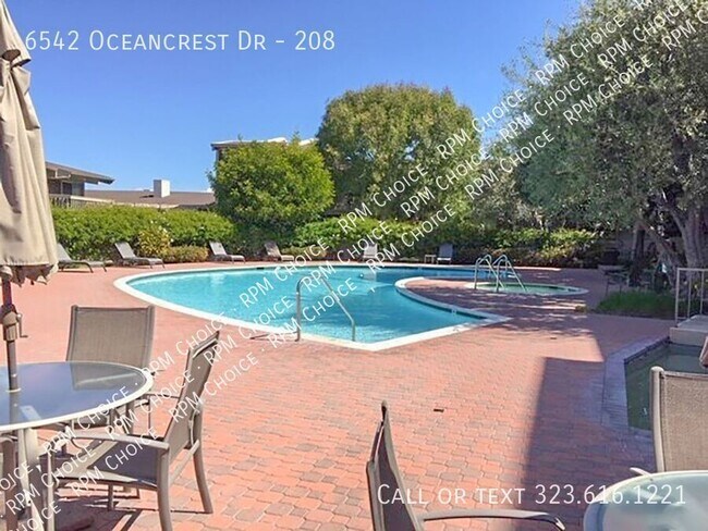 Building Photo - 6542 Oceancrest Dr-208