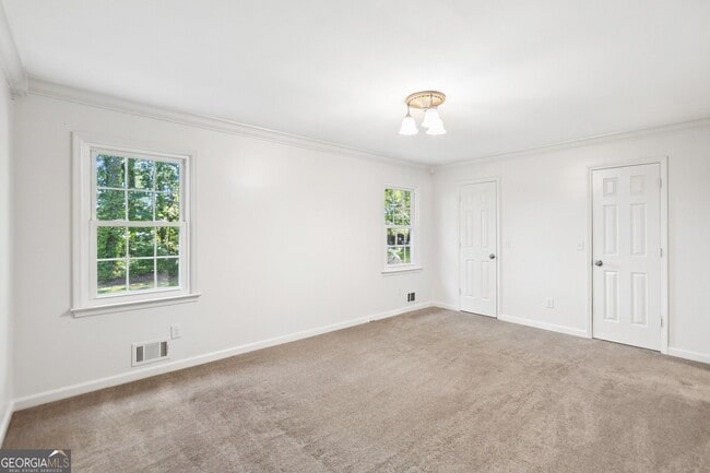 Building Photo - 5659 Whispering Pines Rd