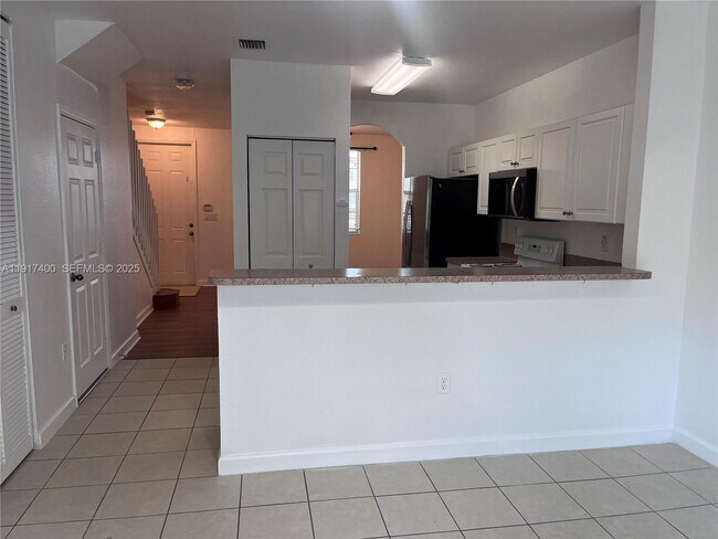 Building Photo - 3355 NE 13th Cir Dr