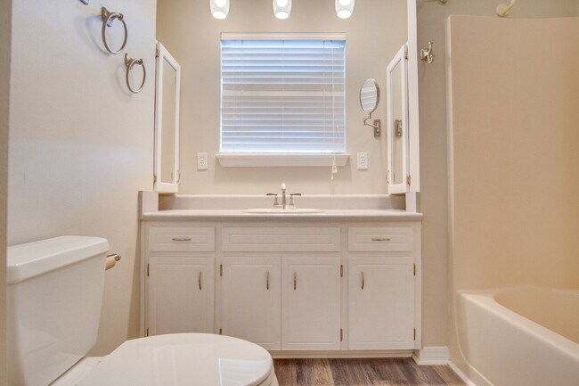 Building Photo - Live the Gulf Breeze Waterfront Life – Dock, Canal Access & Boat Lift!