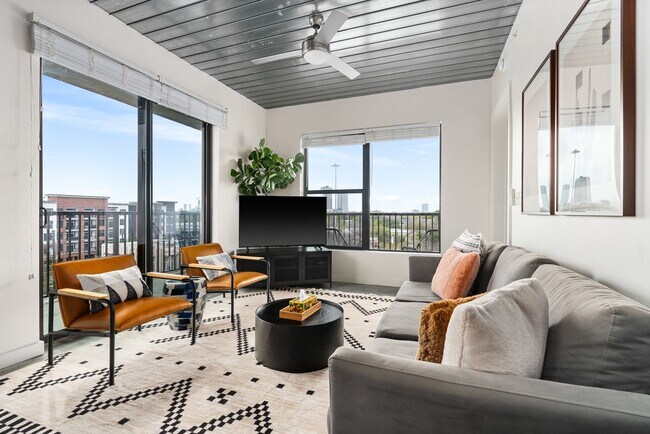 Building Photo - Midtown Magic: Big Savings + Big Perks!