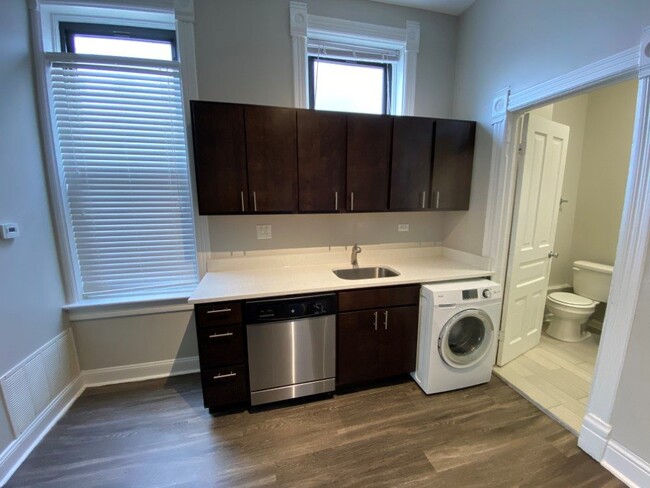 Washer dryer combo in kitchen - 2346 W McLean