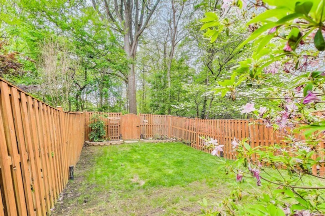 Building Photo - COMINGS SOON - Beautifully Updated Winchester-Built Townhome Backing to Serene Parkland.
