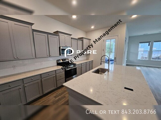Building Photo - 203 Magnolia Garden Dr