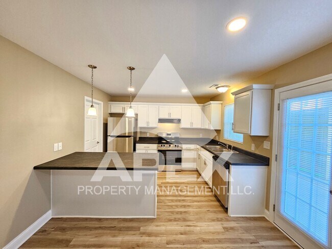 Building Photo - AVALON TOWNHOMES – LIKE NEW - 2 Bd/2.5 Ba ...