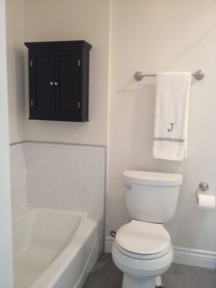 newly remodeled master bathroom with tub - 14572 Dickens St