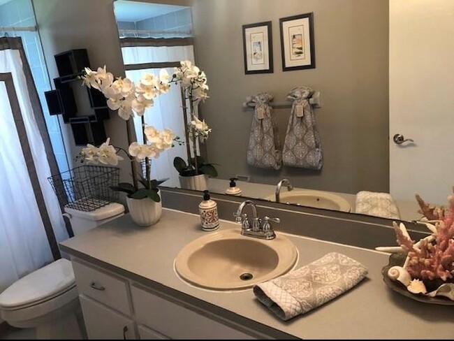 New Photo coming soon! This bathroom has been completely update (Old photo shown) - 2321 SE 5th Ct