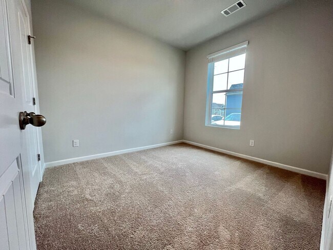 Building Photo - New 3 Bedroom, 2.5 Bathroom Townhouse w/ C...