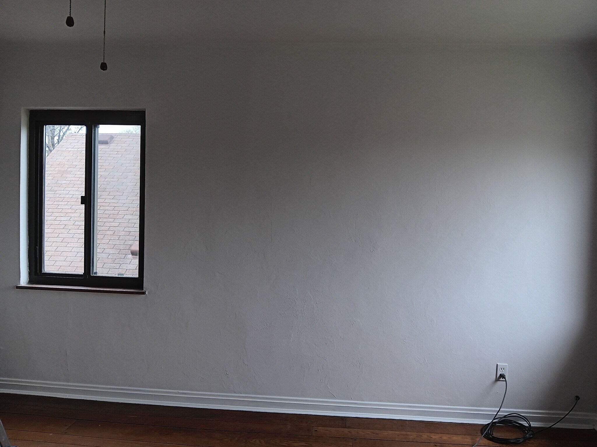 Newly painted wall in living room - 4525 Roth Ave