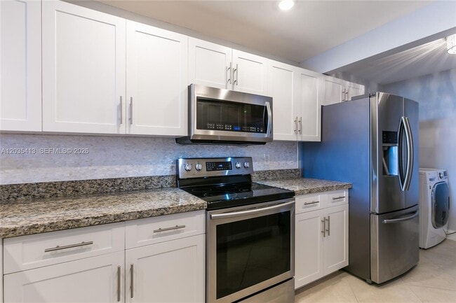 Building Photo - 14 Royal Palm Way