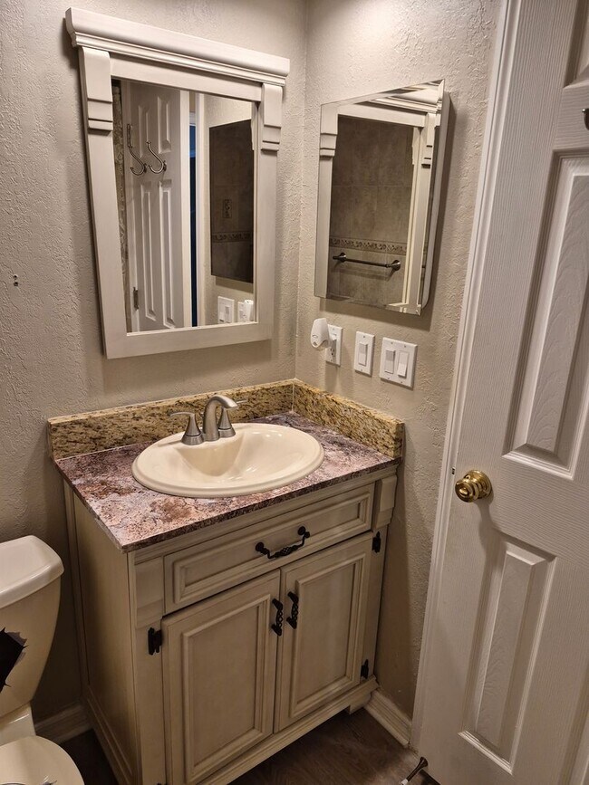 Building Photo - Waterfront Community Living | Updated 2BR/2BA Condo with Private Beach Access
