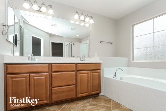 Building Photo - 7600 Scarlet Tapestry Ct