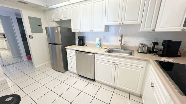 Building Photo - 19370 Collins Ave