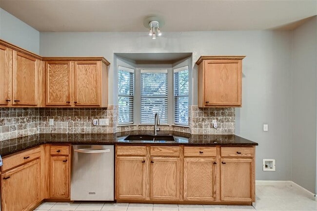 Building Photo - 5320 Spirea Cove