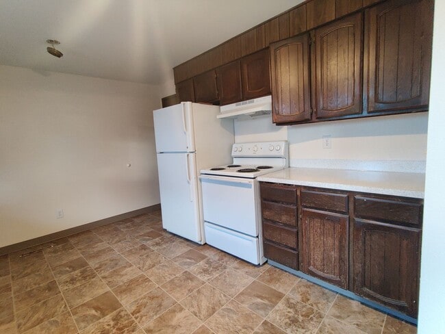 Building Photo - Duplex with garage and fenced yard and upd...