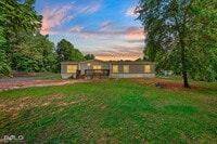 Building Photo - 4BD/2BA home with fenced back yard.
