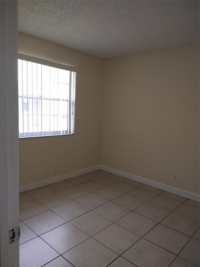 Building Photo - 8395 Royal Palm Blvd