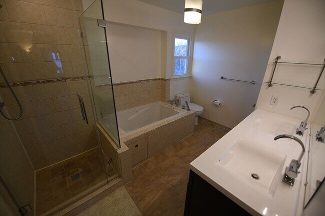 Building Photo - Gorgeous 4 BR 2+2 Baths Colonial - Finished Walk-Out Basement and Car Garage