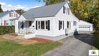 Building Photo - Spacious 4-Bedroom Home with Garage & Mode...