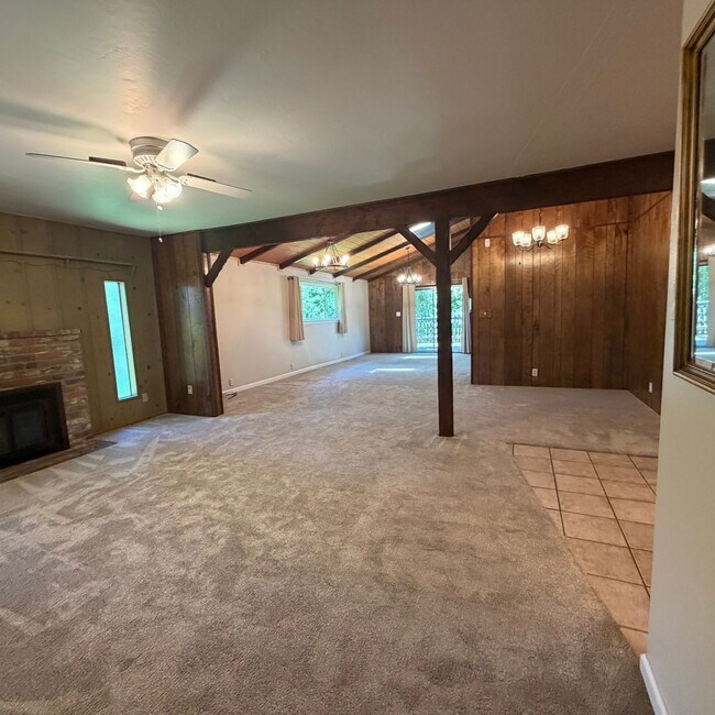 Building Photo - Adorable house with large deck,  yard and RV access