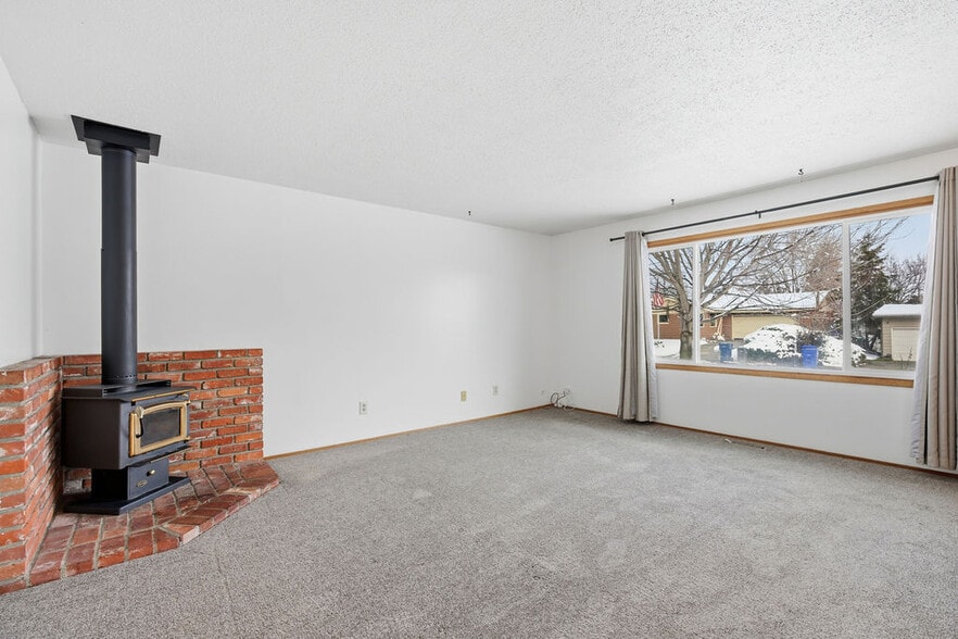 Wood Stove in Living Room - 12202 E 10th Ave