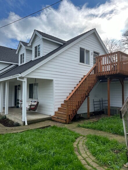 Upstairs tenant's apartment stairs. - 2143 SE Douglas Ave
