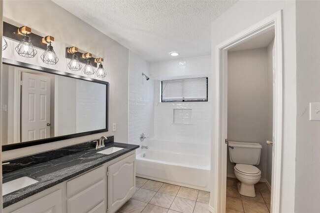 Building Photo - Welcome to this stunningly updated, three-bedroom, two-bath home located in the desirable Valley ...