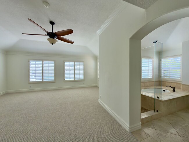 Building Photo - Elegant Mediterranean Living with Private Pergola Garden & Resort Amenities