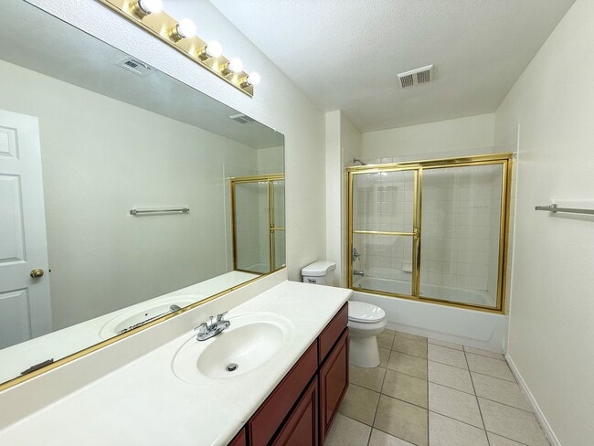 Building Photo - SPACIOUS HOME IN GATED COMMUNITY WITH POOL, RV PARKING & 4-CAR GARAGE!