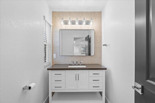 Building Photo - COMPLETELY REMODELED, BRIGHT & AIRY, TRI-LEVEL HOME W/ TOP-FLOOR GREAT ROOM LIVING SPACE, 2-CAR G...