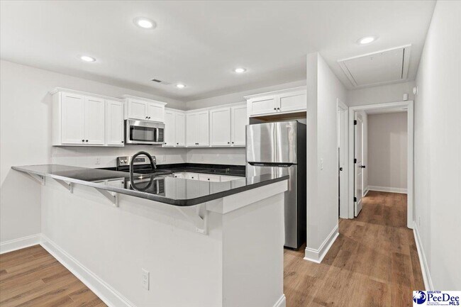 Building Photo - 323 S McQueen St