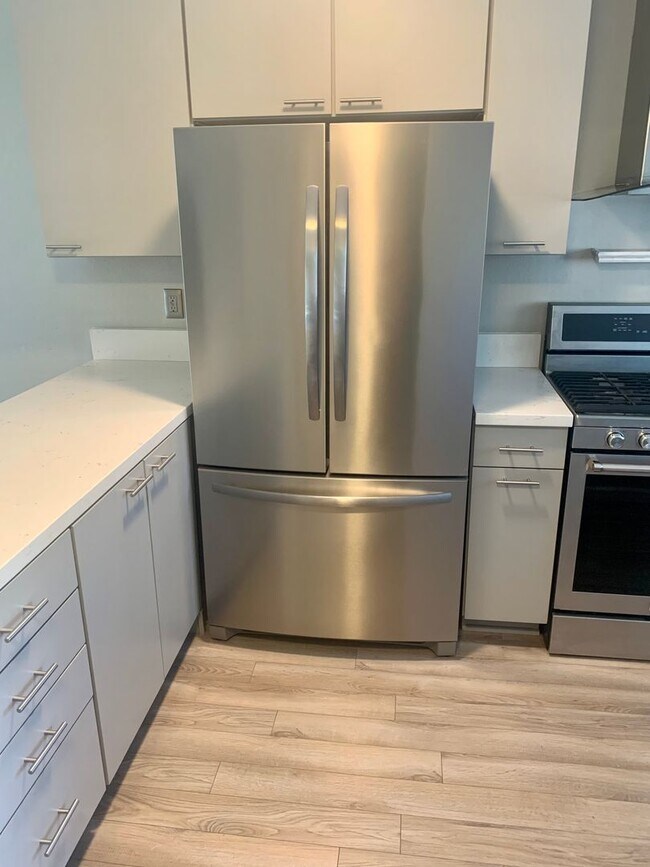 Building Photo - Remodeled, Upstairs 2BD / 1BA Condo Less Than 1/2 Mile From the Beach