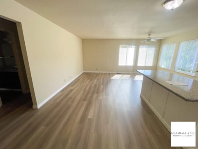 Building Photo - UPDATED AND BEAUTIFUL 2BR/1BA DUPLEX TOWNHOME, NEW WOOD FLOORING, PRIV. ENCLOSED BACK YARD, 2 CAR GA