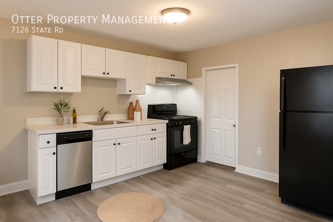 Building Photo - 7126 State Rd.