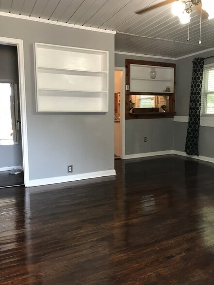 3 shelf display center adjacent to central hallway entrance - 1407 W Church St