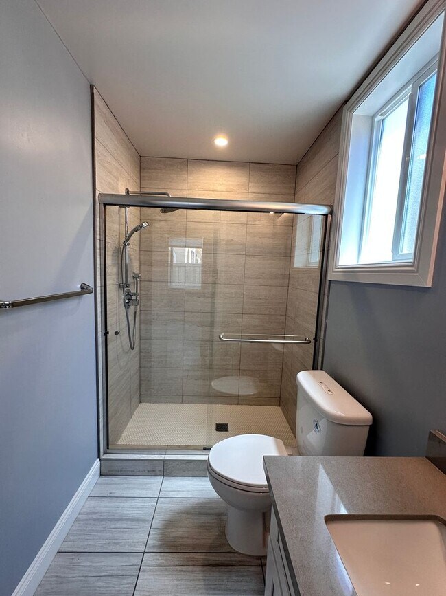 Building Photo - Attached separate first floor 1-bedroom, 1-bathroom suite