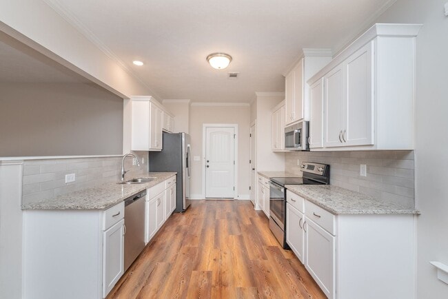 Building Photo - Welcome home to Summerton Village, where beauty, comfort, and value come together effortlessly.