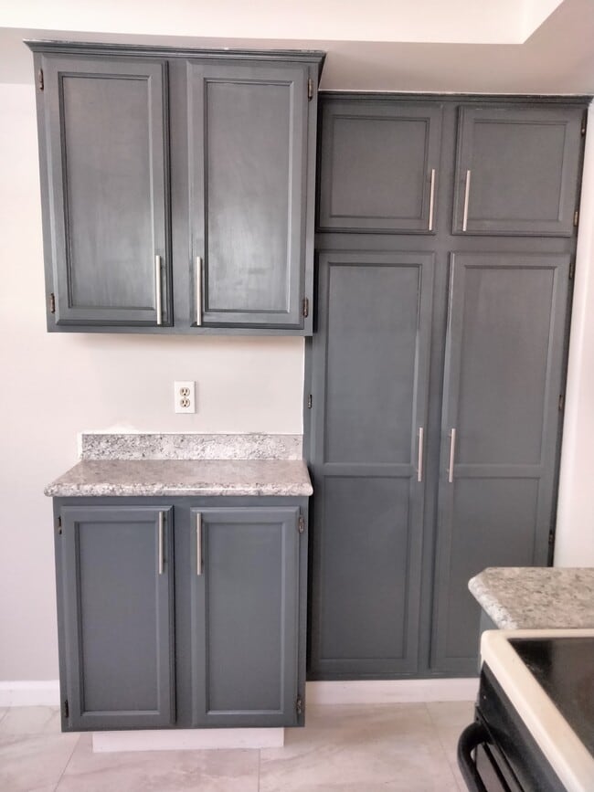 Freshly painted cabinets, new hardware, & new countertop - 1004 Gould Rd