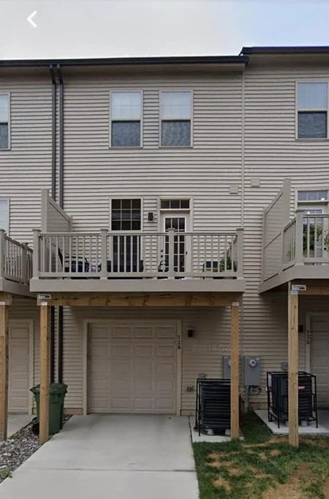 Building Photo - Modern 2BR + Office Townhome with Garage &...