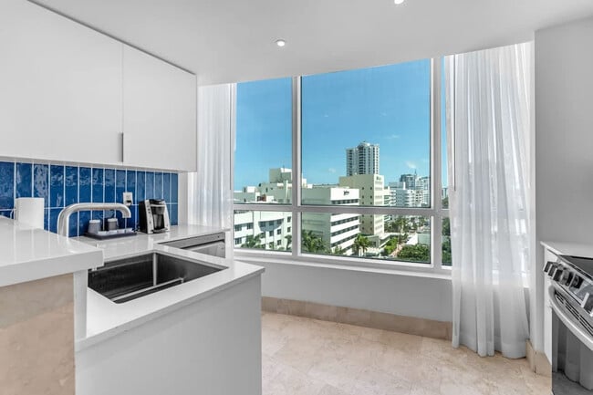 Building Photo - 4401 Collins Ave