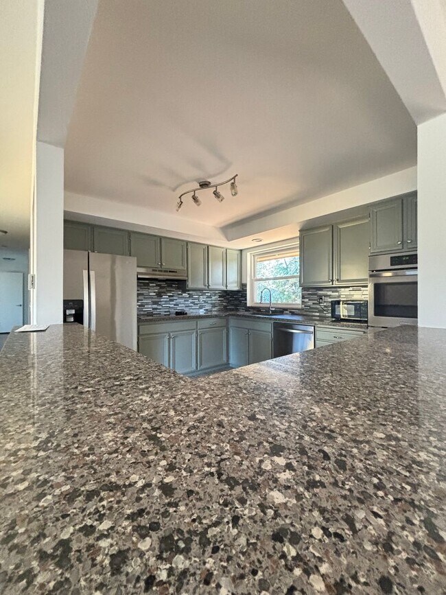 Building Photo - Gorgeous 4-Bd House | Huge Deck, Huge Fenced Yard, & Bonus Room!