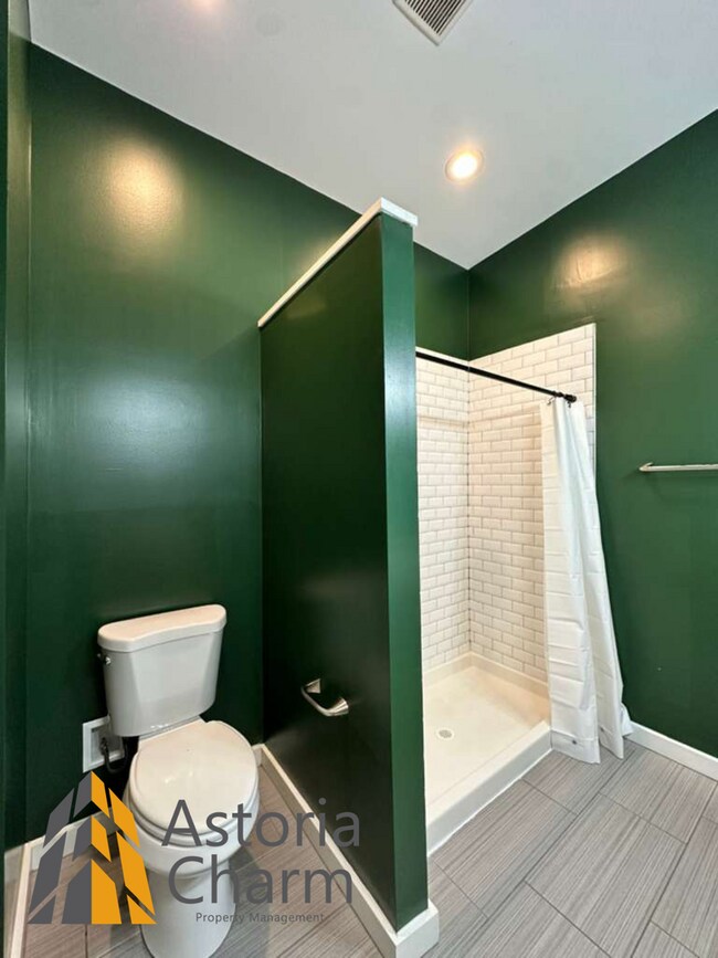 Building Photo - Beautifully Renovated 3BR Rowhome Near Johns Hopkins – Gated Parking + Modern Upgrades