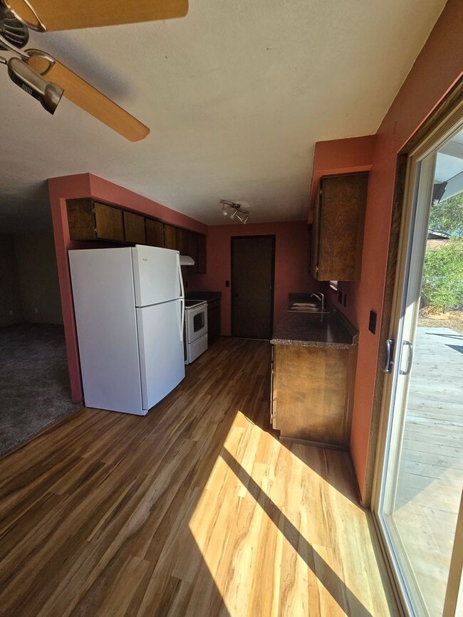 Building Photo - READY NOW. Huge backyard, lovely two bedro...