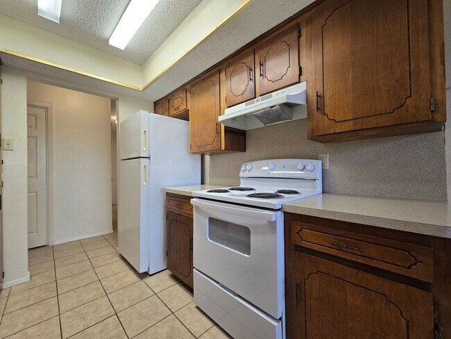 Building Photo - NEW IN MANAGEMENT - AVAILABLE NOW!