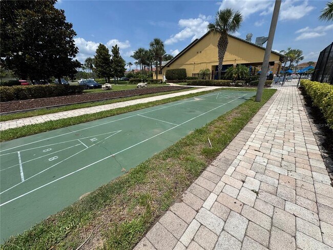 Building Photo - 8977 Coco Palm Rd