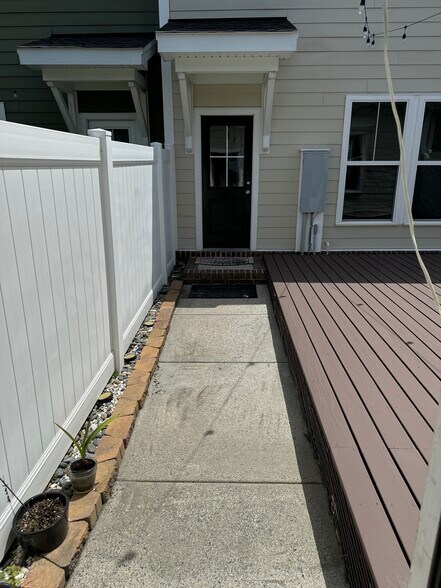 Entrance from garage to deck. - 611 Veery St
