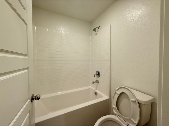 Building Photo - 4 BED 3 BATH 2 CAR GARAGE TOWNHOUSE + LOFT ON CORNER LOT w/ BALCONY